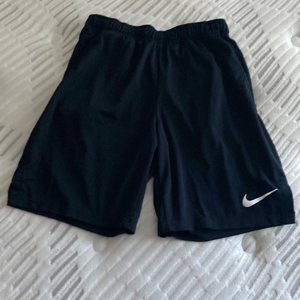 Black Nike polyester shorts size men medium.